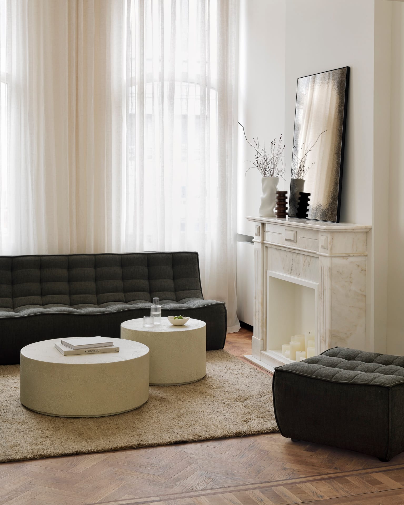 20256_20259_N701_3_seater_footstool_Moss_Eco_26415_26414_Elements_coffee_table_off_white_20677_Aged_wall_mirror_bronze_21751_Dunes_rug_29626_Pisa_object_web