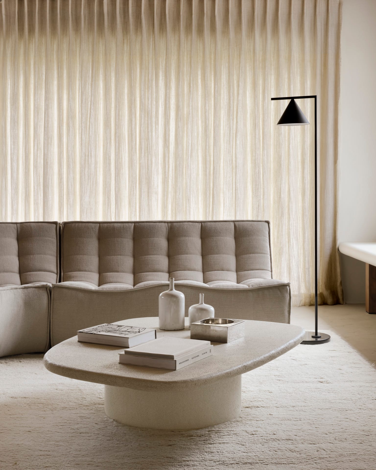 20267_N701_sofa_2_seater_20264_N701_90_round_corner_Ecru_Eco_fabric_26412_Elements_coffee_table_off_white_pebble_shape_21755_Dunes_rug_sand_web